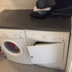 washroom with separate washer and dryer