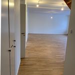 corridor with hardwood floors