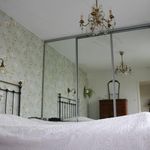 bedroom featuring a chandelier
