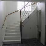 stairs featuring tile flooring