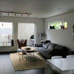 living room featuring plenty of natural light