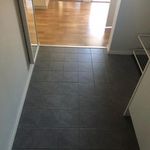 corridor featuring tile floors