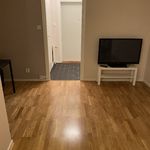spare room with parquet floors and TV