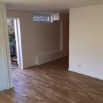 spare room featuring hardwood flooring