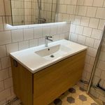 bathroom featuring tile flooring and vanity