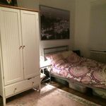 bedroom featuring radiator