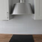 room details with fume extractor and electric cooktop