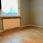 spare room featuring hardwood flooring