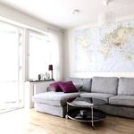 living room with hardwood floors and radiator
