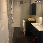 bathroom featuring tile floors and vanity