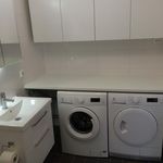 washroom with tile floors and separate washer and dryer