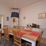 dining area featuring parquet floors