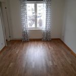 empty room featuring hardwood floors and natural light