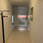 hallway featuring tile floors