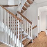 stairway with hardwood flooring