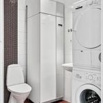 washroom featuring tile flooring and independent washer and dryer