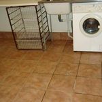 washroom featuring tile floors and washer / dryer