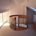 bedroom featuring vaulted ceiling and carpet