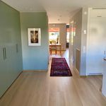hallway featuring parquet floors