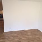 empty room with parquet floors and oven